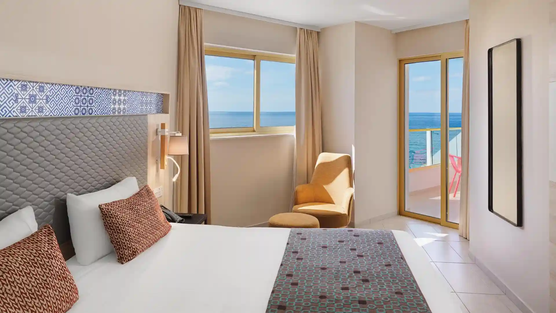 Designed and fournished for four guests, Executive Executive Suite Sea View rooms have private balconies